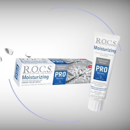 A box and tube of R.O.C.S. Moisturizing Pro toothpaste, designed for dry mouth relief